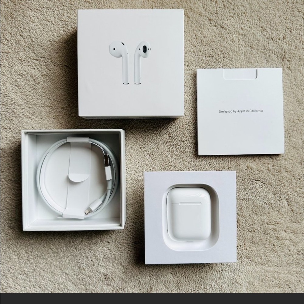 Apple AirPods with Charging Case, 2nd generation, color white, asking $120.00